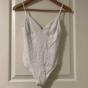 Aritzia White Ribbed Bodysuit (size M)